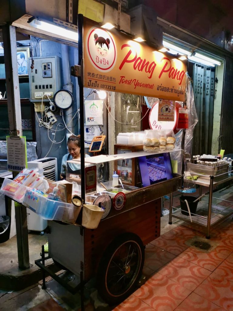 A street card selling sweet bread buns in Chinatown Bangkok.