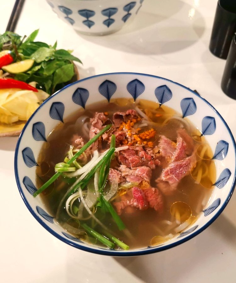 A bowl of authentic Vietnamese beef noodle soup from one of the best pho restaurants in Hoi An.